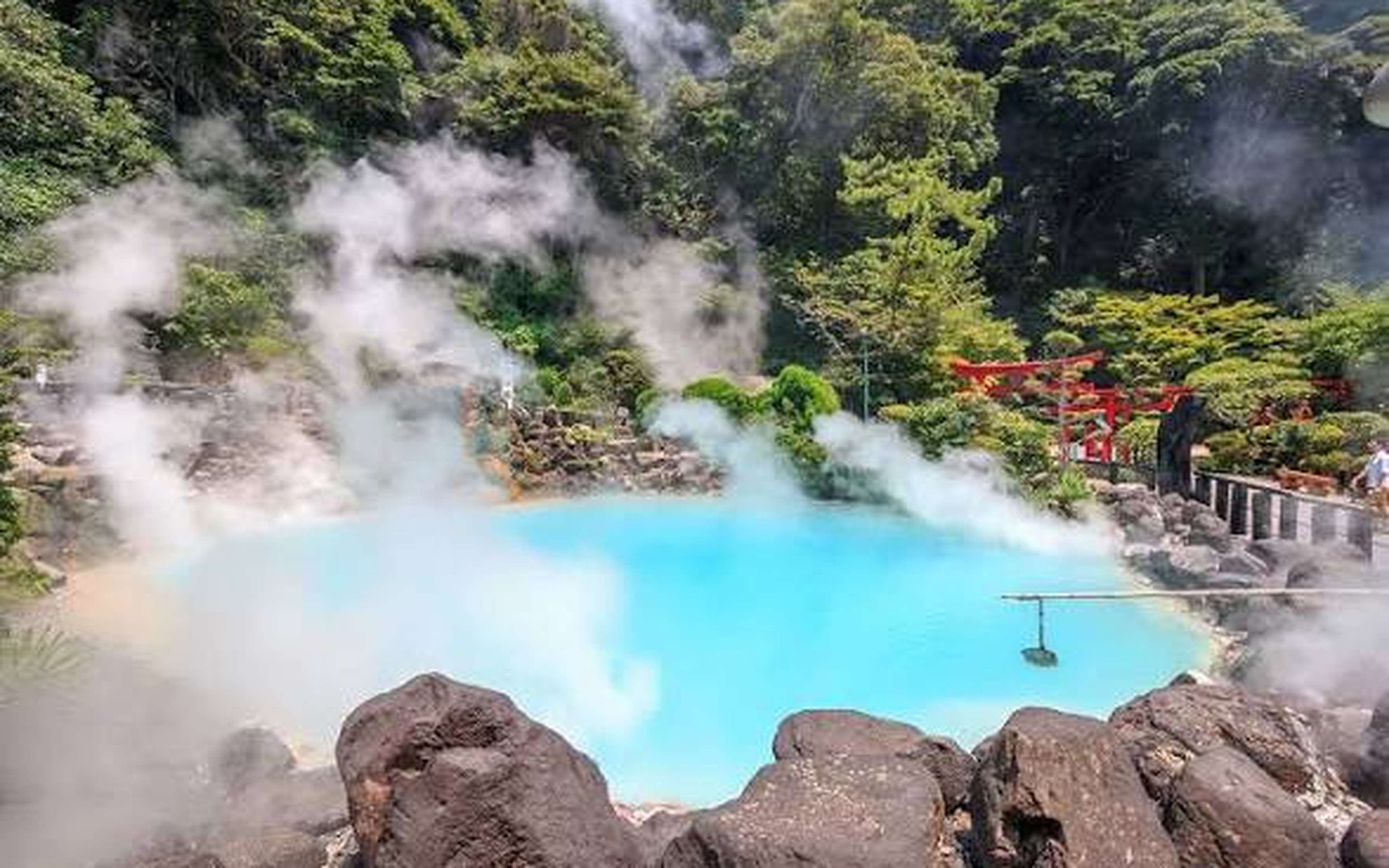 A steaming blue hot-spring pool