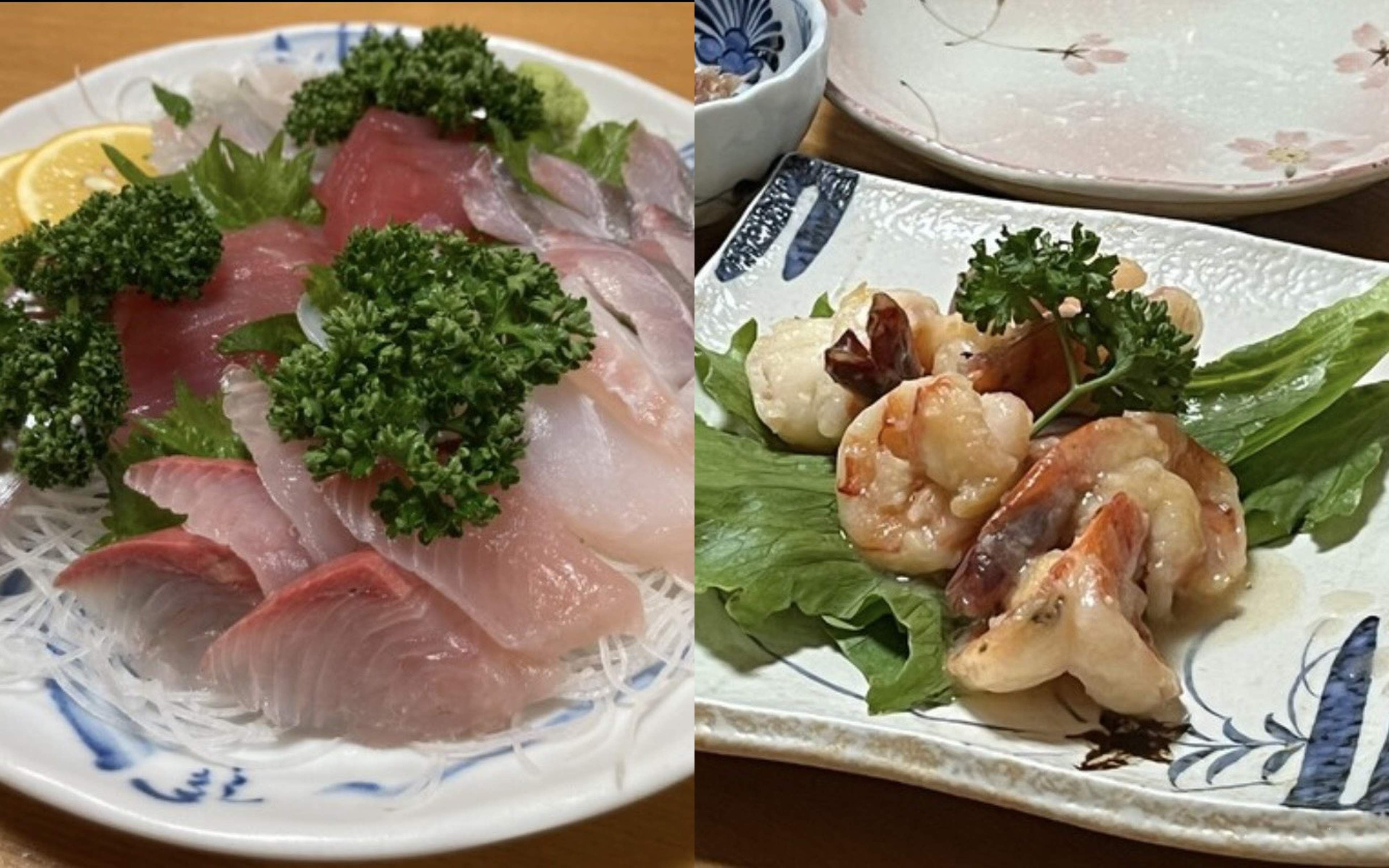 A sashimi platter, and a dish of prawns and scallops