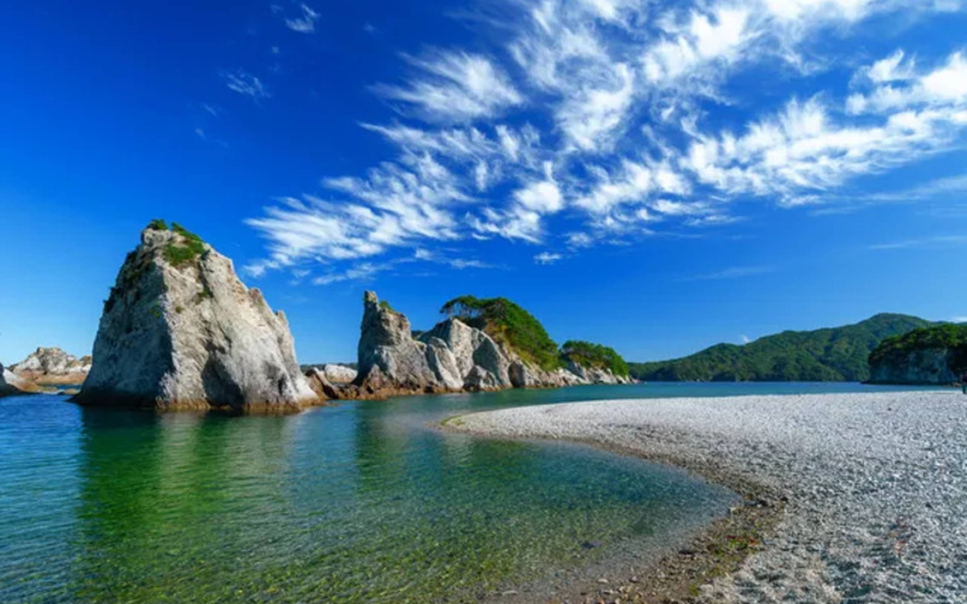 White rock formations and clear green water along the Sanriku coast
