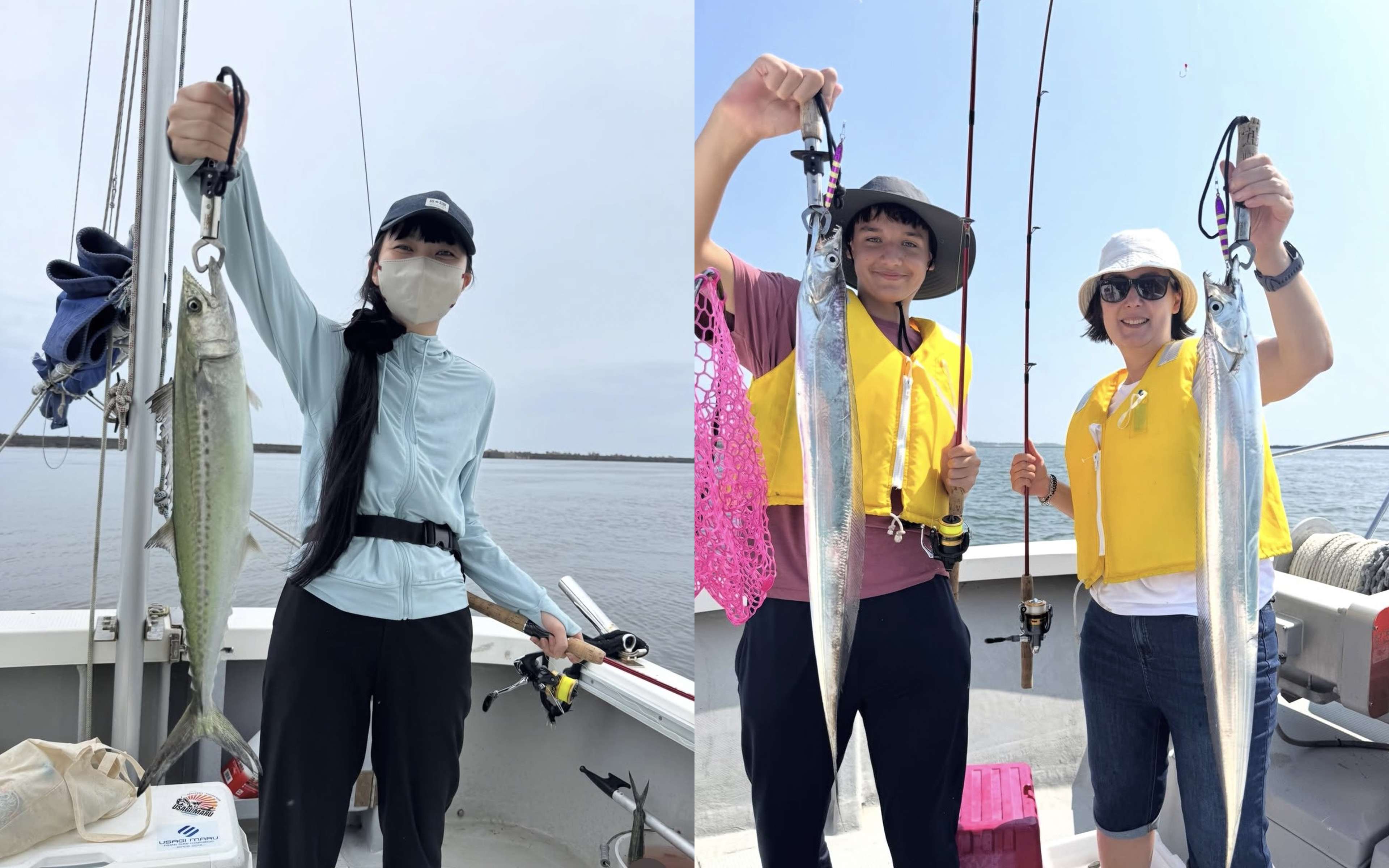 A cooler box marked USAGIMARU next to an angler holding up a long silver fish